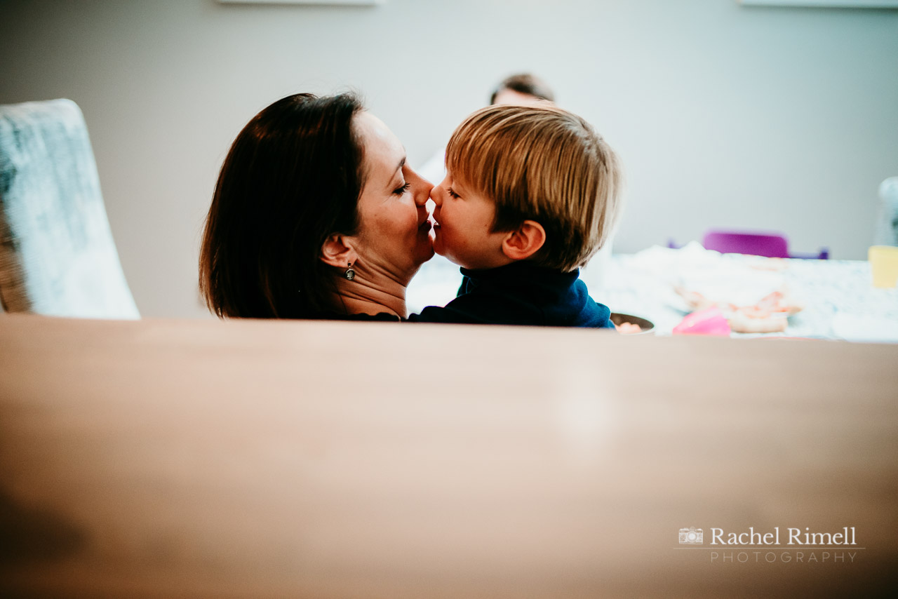 Clapham natural family photos child kissing mother