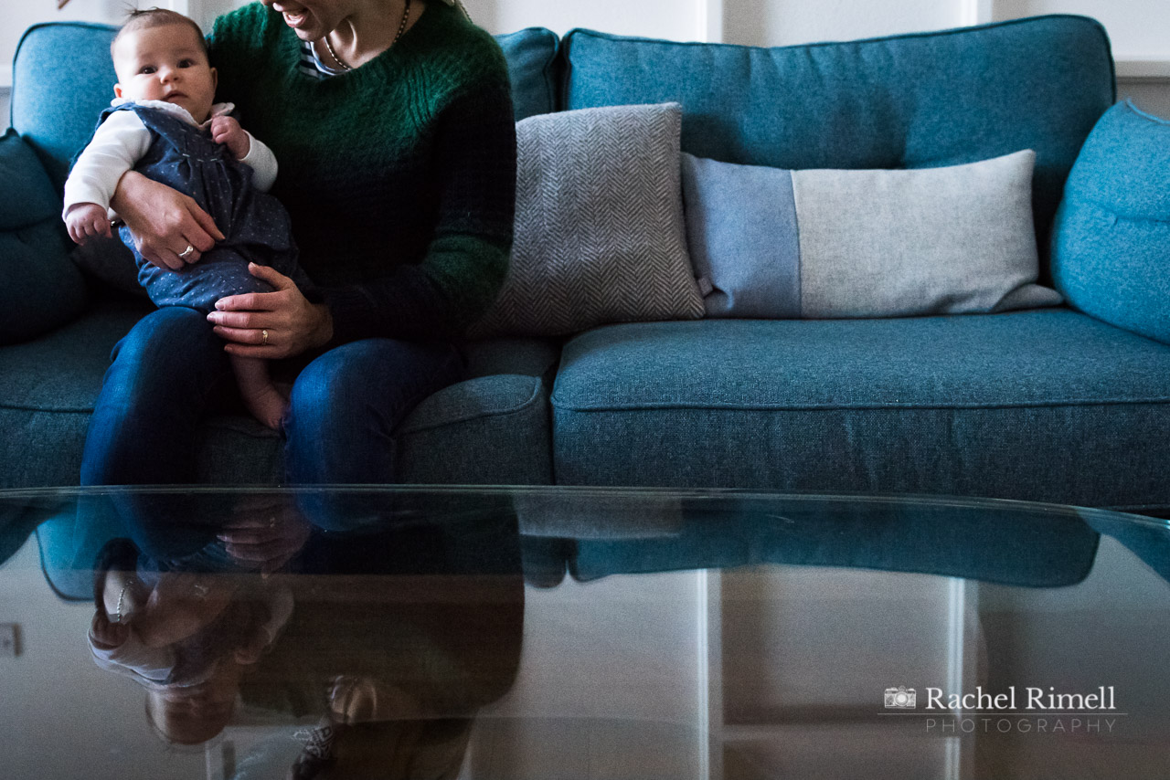 mother and baby on sofa natural photo