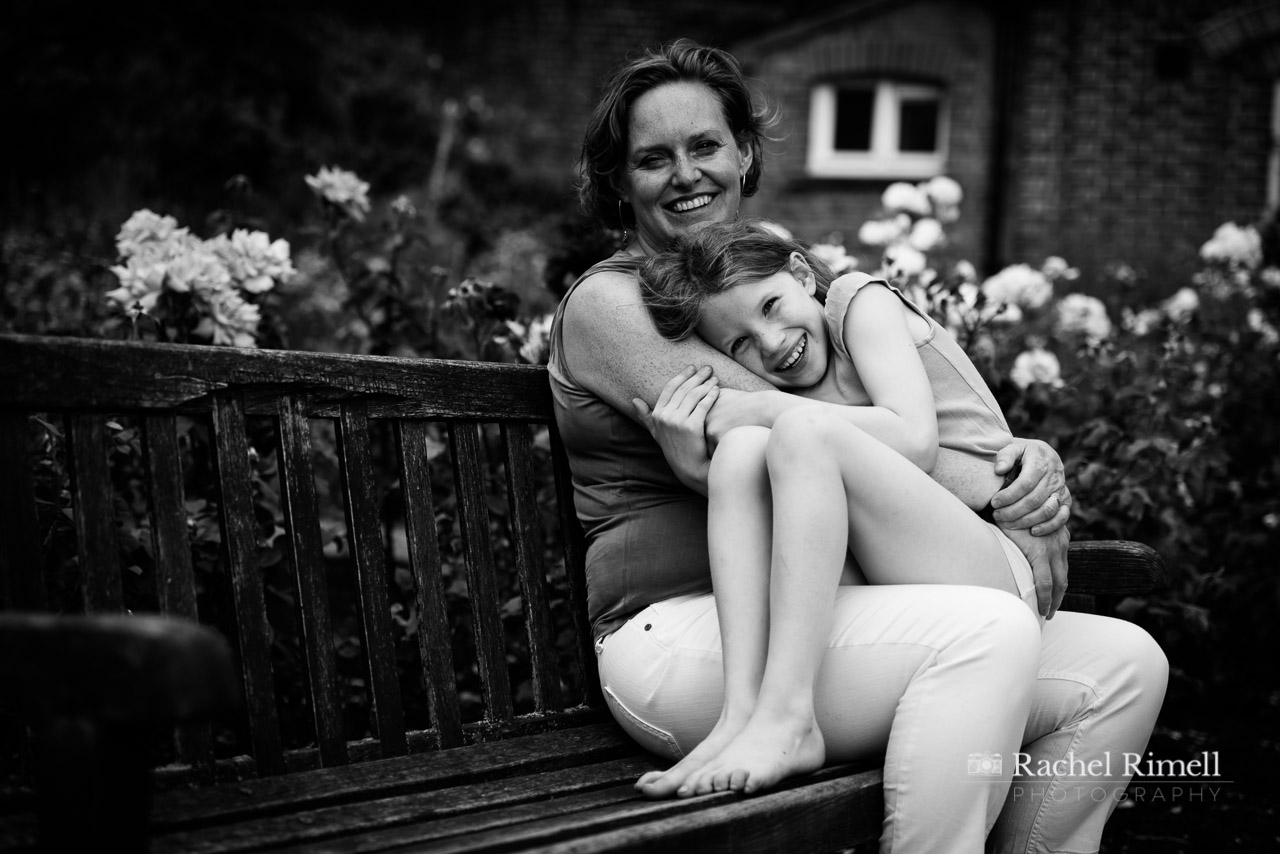 black and white photo of mother and child at Rockwell park London 