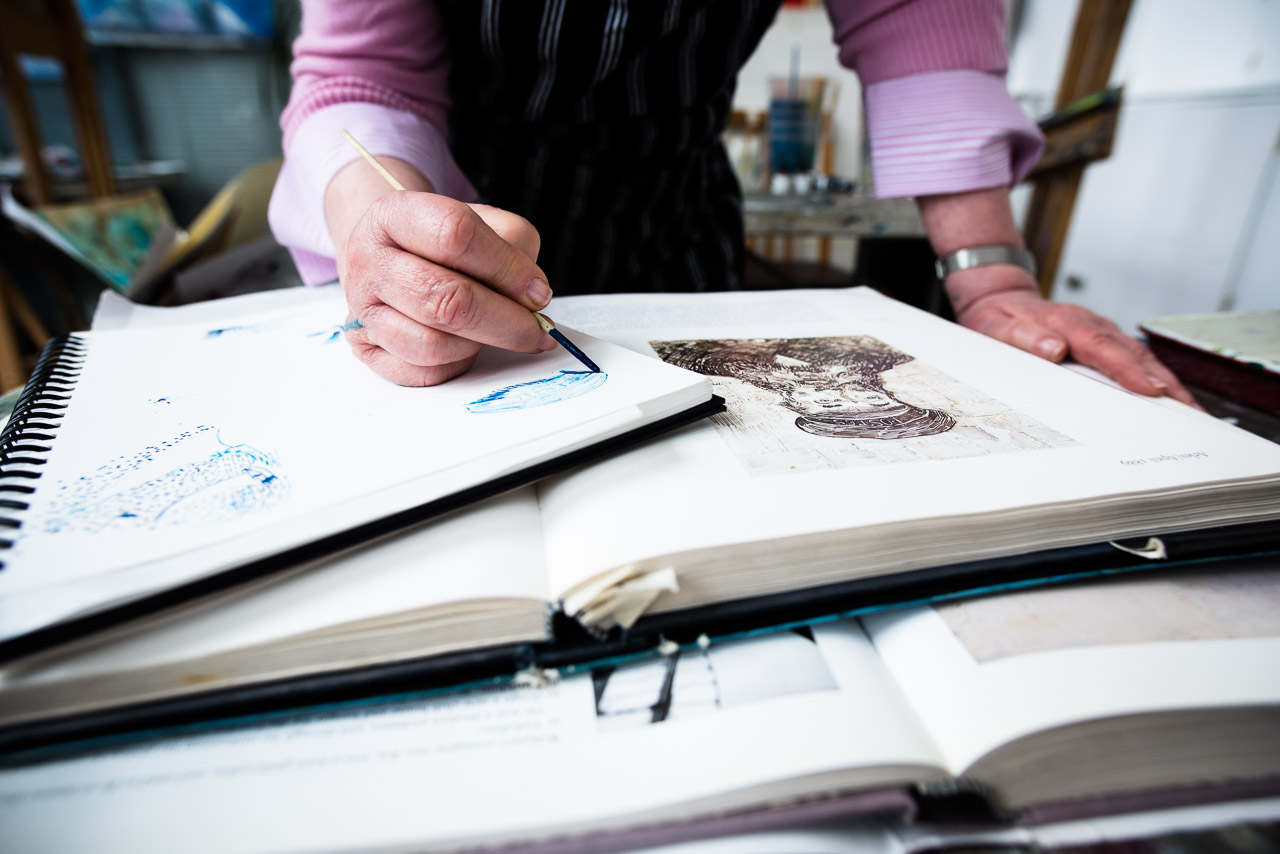London-environmental-portraiture-artists-9 detail image of artist sketching as part of business branding photography Blackheath Conservatoire London