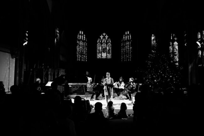 Black and white photo of The Snowman performance by Sydenham Arts