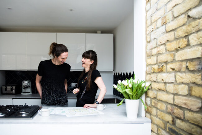 Architects Studio Search London sharing a laugh looking at plans in North London