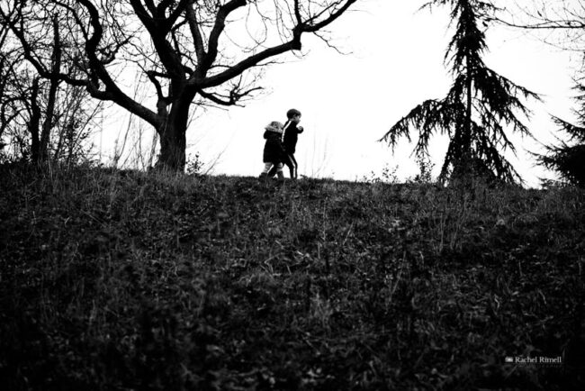 natural family photography brother and sister in black and white in woodland, London