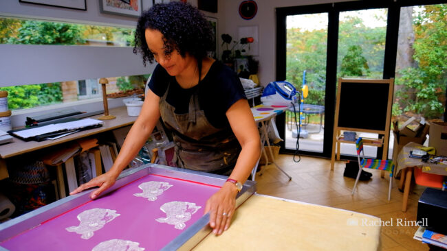 London textile artist Emma Walker at home in her studio with a screen print