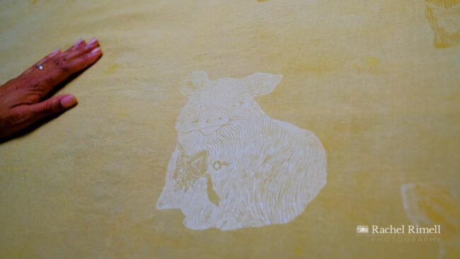 detail of screen print pig on fabric by London textile artist
