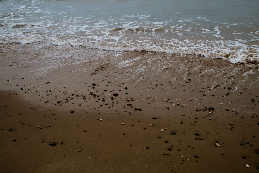 The strandline as the tide goes out at Filey North Yorkshire