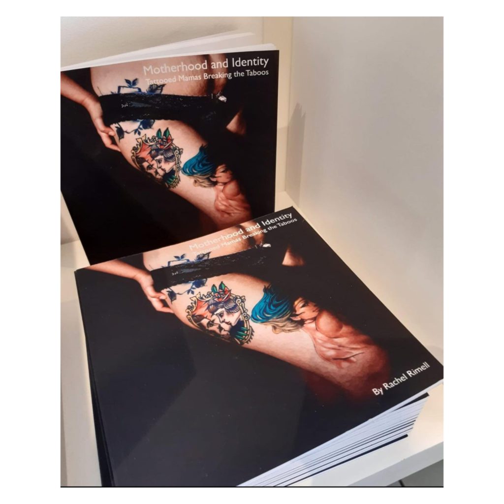 Image of books on tattooed mums